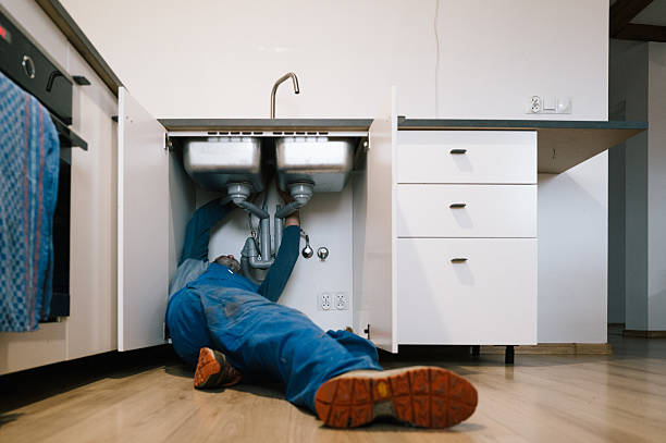 Professional Drain Cleaning technician working in Caledonia, IL